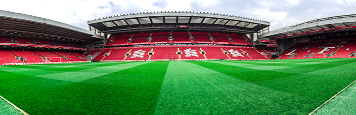 Anfield stadium pre match.  Seats are empty and grass is fine.  Anticipatin is high ahead of the upcoming match vs. Everton.