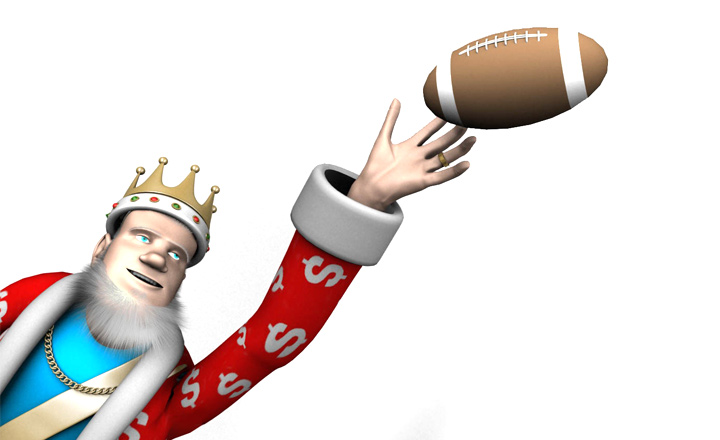 The Sports King is flying through the air about to catch a football with one hand. Spectacular move by the King.