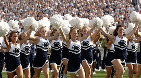 Penn State cheerleaders Penn State cheerleaders lead the Nittany Lions on the field.