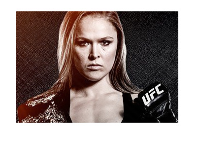 Ronda Rousey representing UFC. Glove up. Serious.