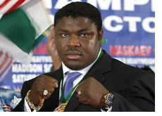 boxer - samuel peter - photo - wearing a suit - match announcement