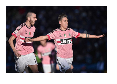 Paolo Dybala and Giorgio Ciellini celebrating a goal in Juve pink away jerseys