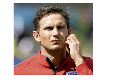 Frank Lampard in deep thought wearing the England warm-up shirt