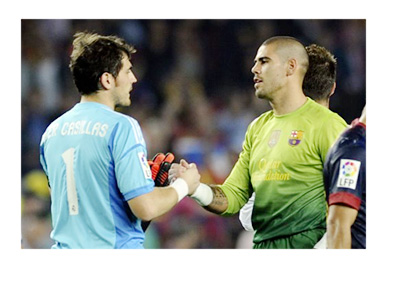 Real Madrid and Barcelona FC legends - Iker Casillas and Victor Valdes - Archive post game photo