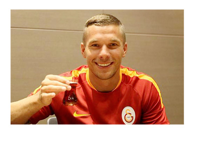 Lukas Podolski is just about to take a sip of Turkish coffee after inking a deal with Galatasaray