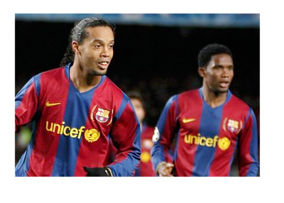 Gaucho Ronaldinho and Samuel Etoo playing for Barcelona FC