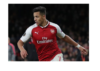 Arsenal FC right winger, Alexis Sanchez, in action for his club. Wearing home red and white kit. The year is 2017.