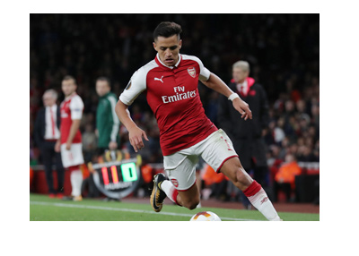 Arsenal FC attacker, Alexis Sanchez, in action - dribbling the ball.  2017-18 season.  Next up: Chelsea FC.