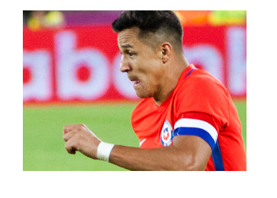 Alexis Sanchez representing Chile. Red kit. Year is 2017.