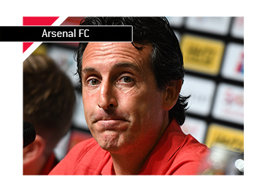 Arsenal FC manager Unai Emery casts a worried figure at a press conference. It is still early in the season. Year is 2018.