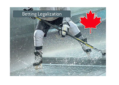 The status of legal betting in Canada. Hockey player bursting out of a laptop computer.