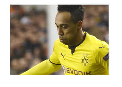 Pierre Emerick Aubameyang of Borussia Dortmund chasing the ball, wearing the traditional yellow.