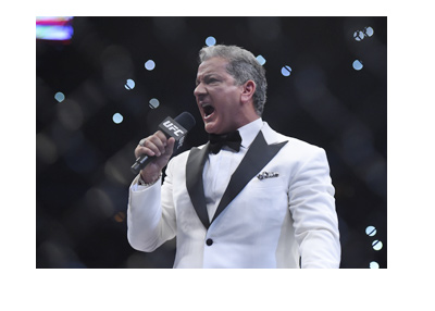 The famous UFC announcer Bruce Buffer, photographed in action moments before the fight starts.