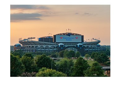 The Carolina Panthers stadium and sunset.  Bank of America.