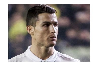 Real Madrid left wing, Cristiano Ronaldo, is looking into the distance.  Match vs. Bayern is coming up.