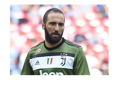 Gonzalo Higuain sporting the Juventus 2017-18 green away kit.