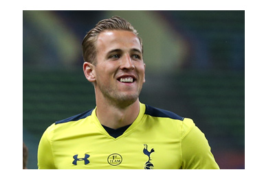Harry Kane sporting the yellow Tottenham Hotspur kit. Big smile on his face. Top goalscorer.