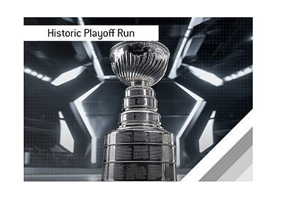 Stanley Cup trophy on ice inside a modern hockey arena with dramatic lighting during the Los Angeles Kings historic 2012 Stanley Cup championship run.