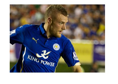 Leicester City forward Jamie Vardy. In action. Dribbling the ball.