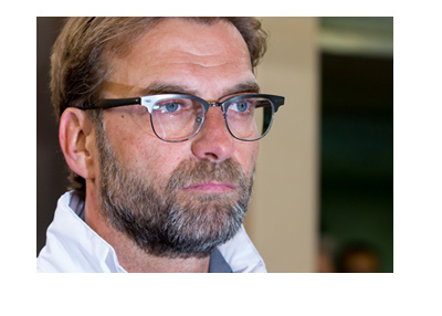 Liverpool FC manager Jurgen Klopp is in the zone.  Gazing into distance.