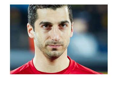 Henrikh Mkhitaryan wearing a Manchester United shirt.  Before the game photoshoot. Year is 2017.