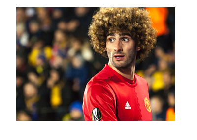 Manchester United midfielder Marouane Fellaini in action wearing the home kit. 2016/17 season.
