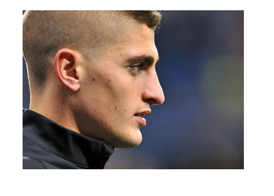 Marco Verratti photographed with a very serious look in his eyes.  Wearing PSG training kit.