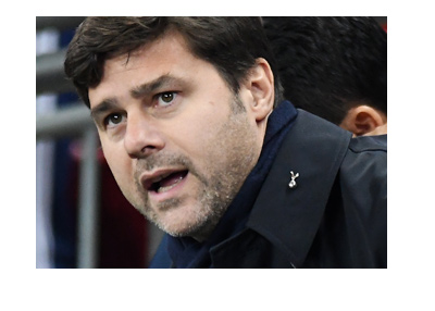 Tottenham Hotspur manager Mauricio Pochettino in action during the game.  Wearing a black coat.