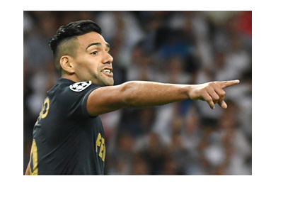 Monaco striker Radamel Falcao. Between whistlers. Away jersey. Season is 2016/17.