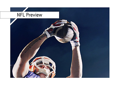 Football player is catching a ball in mid air.  The preview is here for the upcoming week in the american football world.