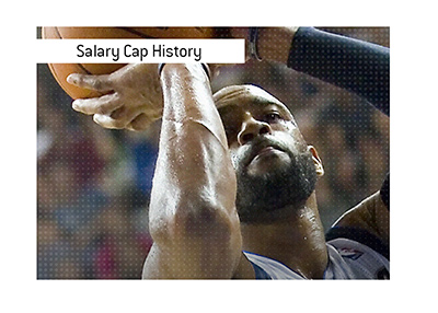 The history of the salary cap in the NBA.  In photo: Vince Carter taking a free throw.