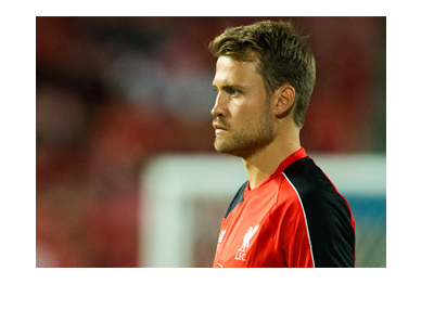 Simon Mignolet of Liverpool FC - Action profile from the side.