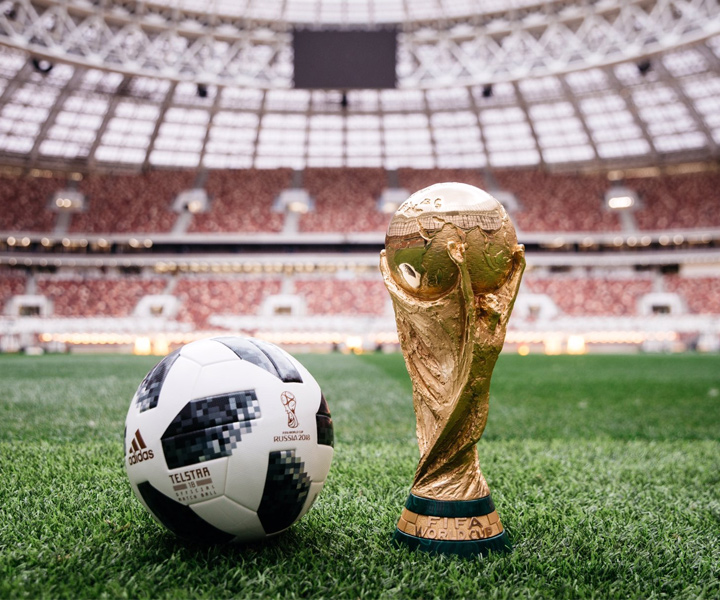 The 2018 World Cup in Russia official ball - Telstar 18 - Photographed next to the World Cup trophy at the Luzhniki Stadium in Moscow.