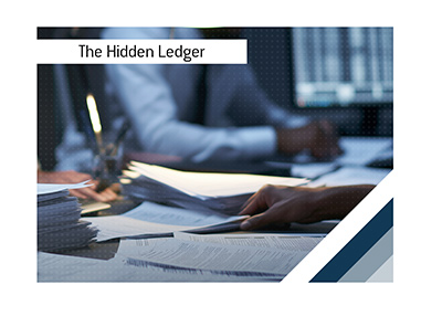 Hidden financial records and paperwork spread across an executive office desk.