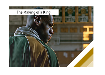 Young LeBron James standing alone in an empty St. Vincent-St. Mary High School gym.