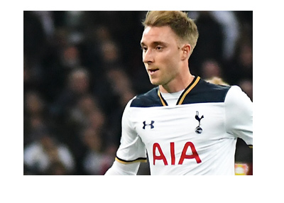 Spurs midfielder Christian Eriksen - Photographed in action wearing the home kit.