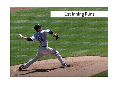 Baseball term 1st Inning Runs meaning is explained.  In photo:  Blue Jays pitcher in action.