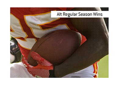 The meaning of the NFL betting term Alt Regular Season Wins is explained.  The King provides an example.  In photo:  KC Chiefs player with the ball.