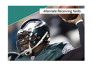 A Philadelphia Eagles player is about to pass the ball.  The term Alternate Receiving Yards is explained when it comes to betting on the sport of American football.
