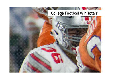 The meaning of the sports betting term College Football Win Totals is explained and an example is provided.  In photo: Tigers vs. Buckeyes action shot.