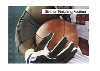 What is the meaning of the sports betting term Division Finishing Position?  The King explains.  In photo:  Arizona Cardinals player with the ball.