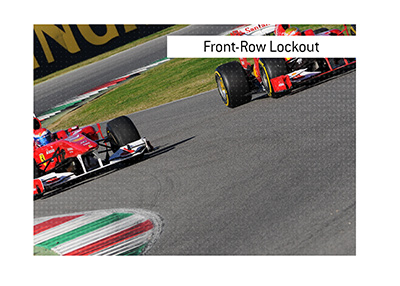In photo: Two Ferrari F1 cars locking out the front.