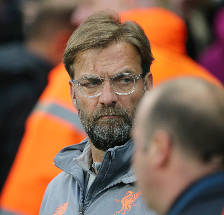 The father of Heavy Metal Football - German manager Jurgen Klopp - Wearing the Liverpool FC colours.  The year is 2018.