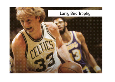 One of the basketball greats - Larry Bird of the Boston Celtics in action with the ball.