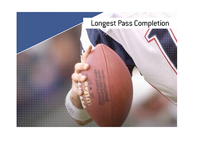The meaning of the betting term Longest Pass Completion is explained.  In photo:  Tom Brady throwing a pass.