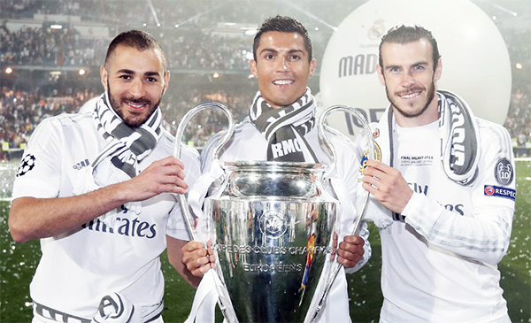 The Bale, Benzema and Cristiano posing with the UCL trophy.  The BBC.