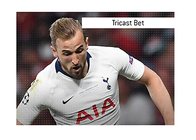 In photo:  Harry Kane of Tottenham Hotspur in action, wearing the white kit.  Definition of Tricast Bet.