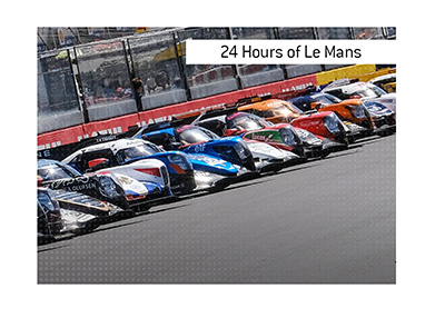 The famous endurance car race - 24 hours of Le Mans.  Cars in line waiting for the start.