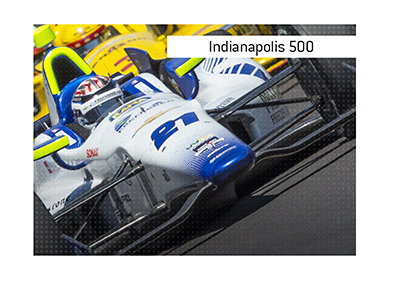 Indianapolis 500 indy car racing betting.  One of the most historic and popular races in the world.  In photo: Two cars going at it on the IMS, Indianapolis Motor Speedway.