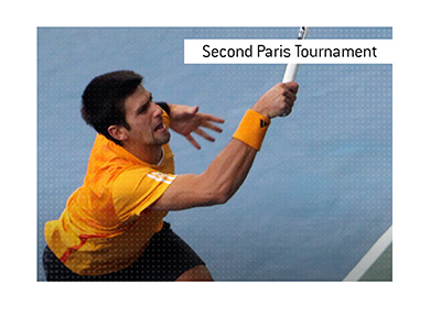 Novak Djokovic playing on the green indoor hard court.  Rolex Paris Masters 1000 tennis tournament.